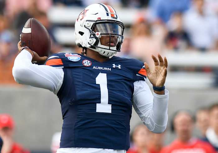 Auburn Tigers quarterback T.J. Finley (1) passes against Houston during the Birmingham Bowl at Protective Stadium in Birmingham, Ala., on Tuesday December 28, 2021. Bham06